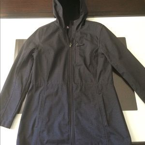 Raincoat with adjustable waist
